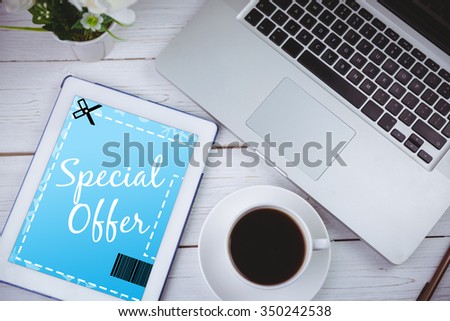 Discount coupon against tablet on desk