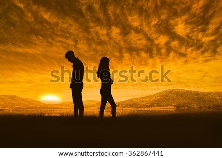 Upset couple not talking to each other after fight against beautiful african scene