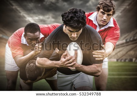 3D Rugby stadium against rugby players tackling during game