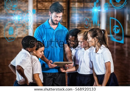 Fitness interface against sports teacher and school kids using digital tablet in basketball court