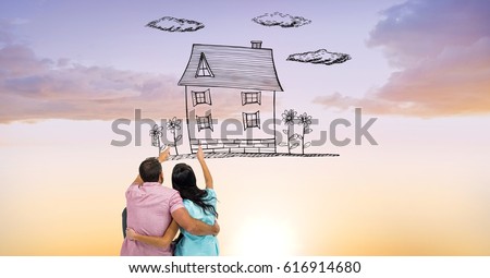 Digital composite of Digital composite image of couple pointing at dream house