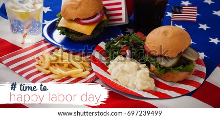 Digital composite image of time to happy labor day text against salad and burger in plate on american flag