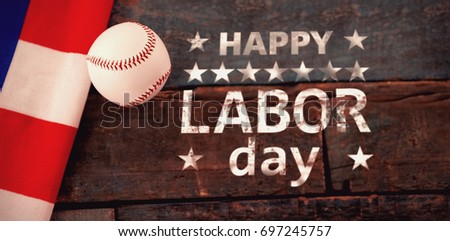 Poster of happy labor day text against baseball ball and american flag on table
