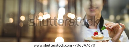 Digital composite of Chef holding dessert tart with elegant blurry lights transition