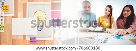 Digital composite of Business people having a meeting with ideas transition effect