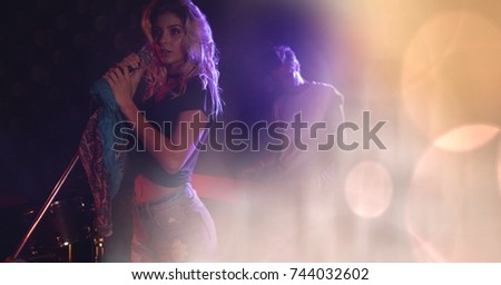 Digital composite of girl singing at concert with transition