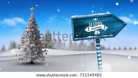 Digital composite of Happy holidays text on Wooden signpost in Christmas Winter landscape with Christmas tree