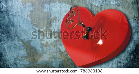 Love heart lock against rusty weathered wall