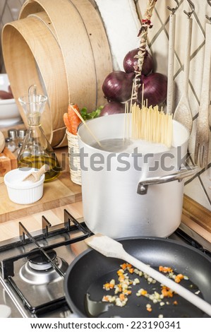 pasta in boiling water in italian kitchen style