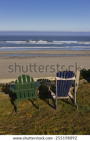 YACHATS, OREGON, USA - JULY 24, 2009: Two chairs and view of beach on central Oregon coast, Cape Perpetua Scenic Area.