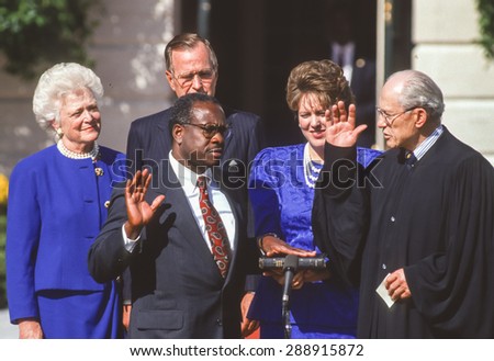 WASHINGTON, DC, USA - U. S. Supreme Court Justice Clarence Thomas sworn in White House. L-R: Barbara Bush, President Bush, Thomas, wife Virginia Lamp Thomas, Justice Byron White. October 18, 1991