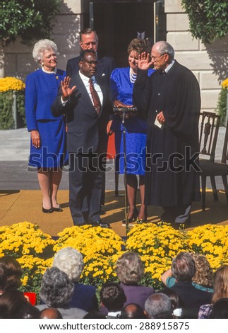 WASHINGTON, DC, USA - U. S. Supreme Court Justice Clarence Thomas sworn in White House. L-R: Barbara Bush, President  Bush, C. Thomas, wife Virginia Lamp Thomas, Justice Byron White. October 18, 1991