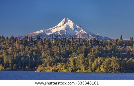 HOOD RIVER, OREGON, USA - SEPTEMBER 19, 2015: Mount Hood, 11,241 ft (3,429 m) glaciated mountain in Cascade Range, and the Columbia River.