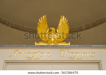 ARLINGTON, VIRGINIA, USA - JANUARY 7, 2016: Gold leaf eagle and name over Post Office door. in Clarendon neighborhood.