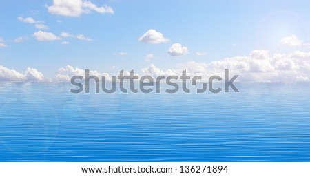 Blue sky with white clouds and beautiful blue ocean