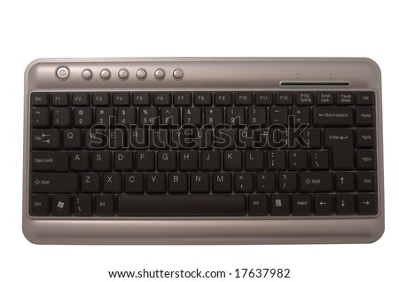 small slim PC keyboard in silver case with black keys
