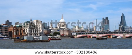 View on Saint Pauls Cathedral Blackfriars bridge and city skyscrapers from the south bank of Thames in London
