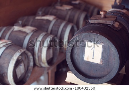 An aromatic vinegar wood barrels array from an italian family\'s private collection with serial number on one of them.