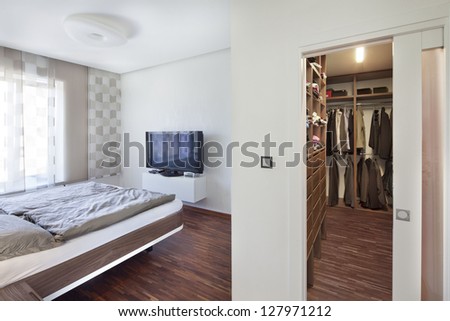 nice new bedroom with storage space for clothes and wardrobe