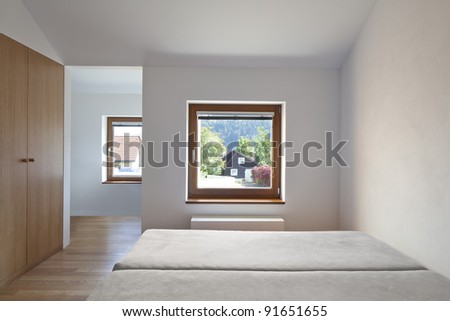 new bedroom with built-in wardrobe and a beautiful view