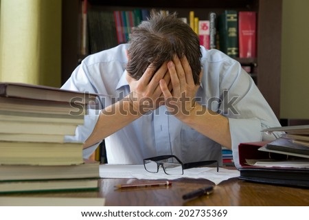 Overworked stressed man