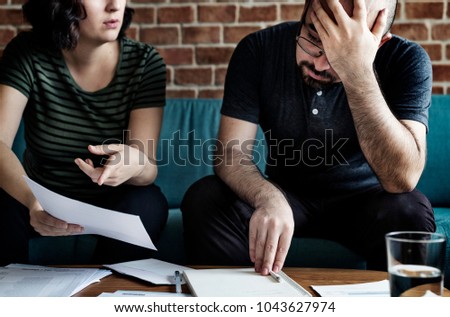 Couple managing the debt