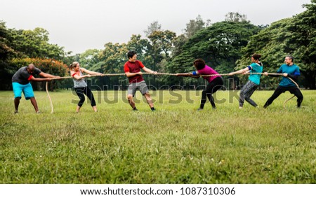 Team competing in tug of war