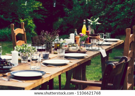 Dinner table set in the garden