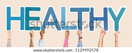 Diverse hands holding the word healthy