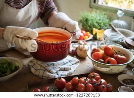 A housewife cooking tomato sauce food photography recipe idea