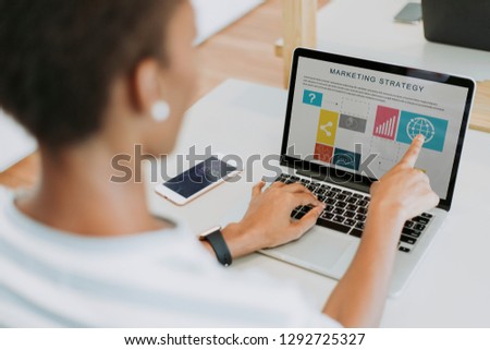 lady working on a laptop in her office