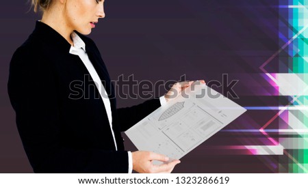 Businesswoman checking on a security system