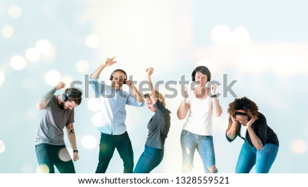 Group of people dancing with headphones on