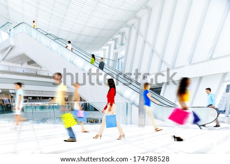 Motion Blurred People in the Shopping Mall