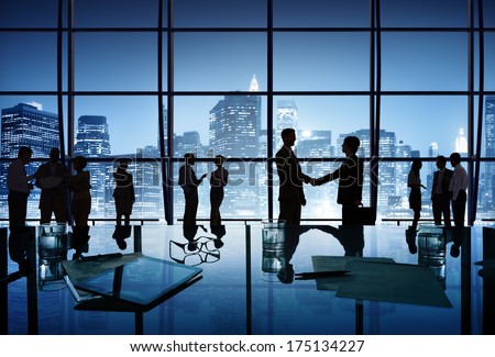 Silhouette Business People In Office With City Skyline