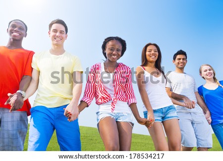 Young Happy World People Holding Hands
