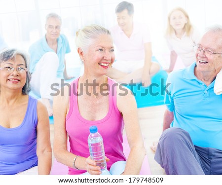 Group of Mature Diverse People Smiling While Exercising