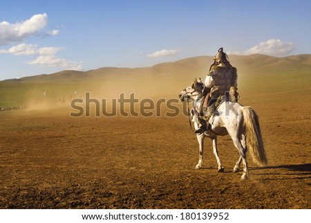 Lone Mongolian Man on a Horse in The Dessert