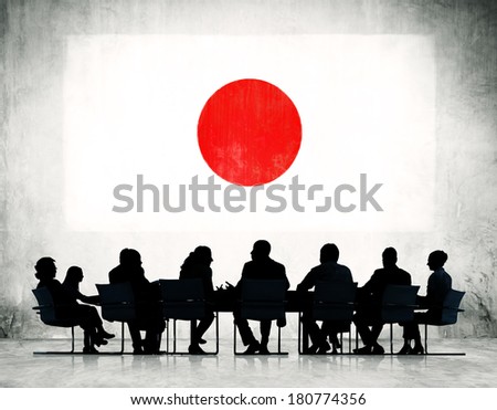 Group of Corporate People Having a Meeting Regarding the National Issues of Japan