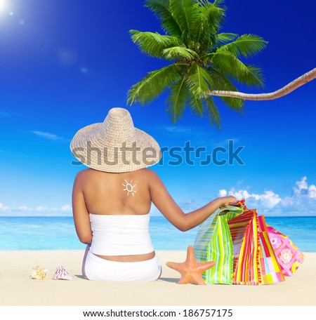 Woman on Holiday by the Beach with Shopping Bags