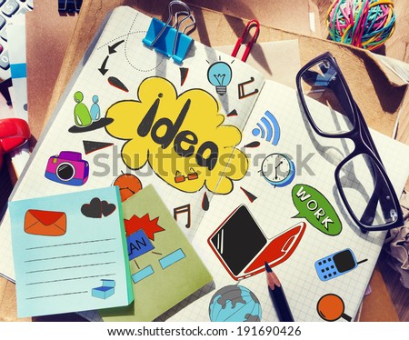 Designer\'s Table with Notes about Ideas and Tools