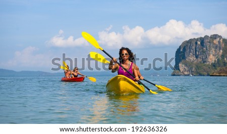 Young couple sea kayaking