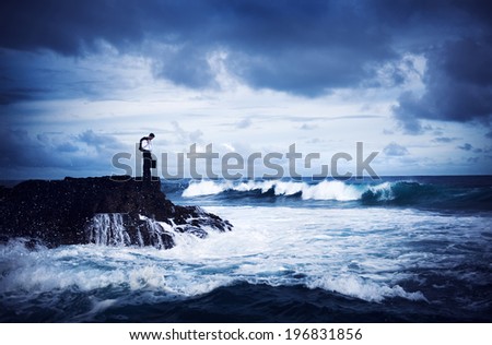 Depressed Businessman Standing by the Sea