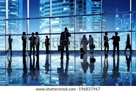 Silhouettes of Business People in a Place of Work