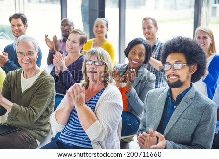 Group of Cheerful People Clapping with Gladness
