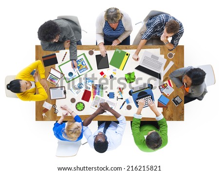 Diverse People Working Together on a Conference Table