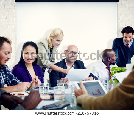 Group of People Meeting with Projection Screen