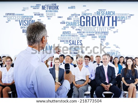Business People Listening to a Business Presentation