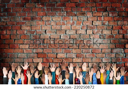 Group of Diverse People\'s Hands Raised
