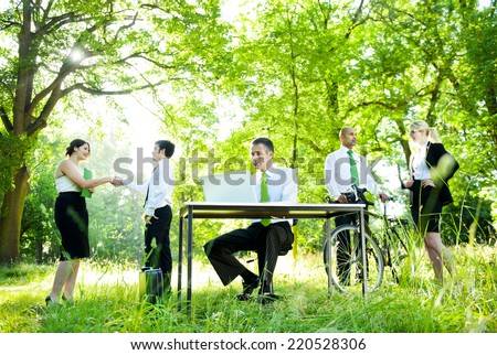 Environmental friendly themed picture of business people working.